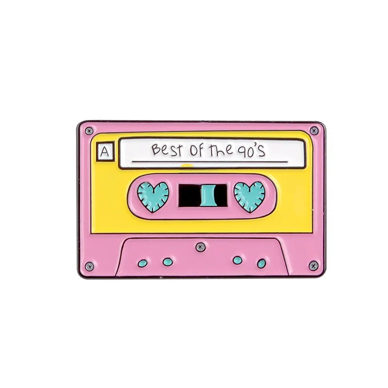 enamel pin of a Pink cassette tape with &