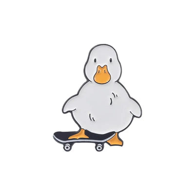 enamel pin of a duck on a skateboard with a white background