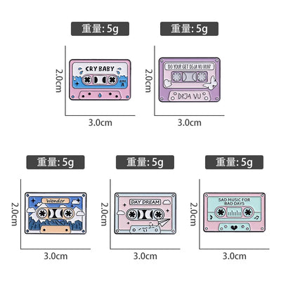 enamel pins cassette tapes with text and dimensions on a white background