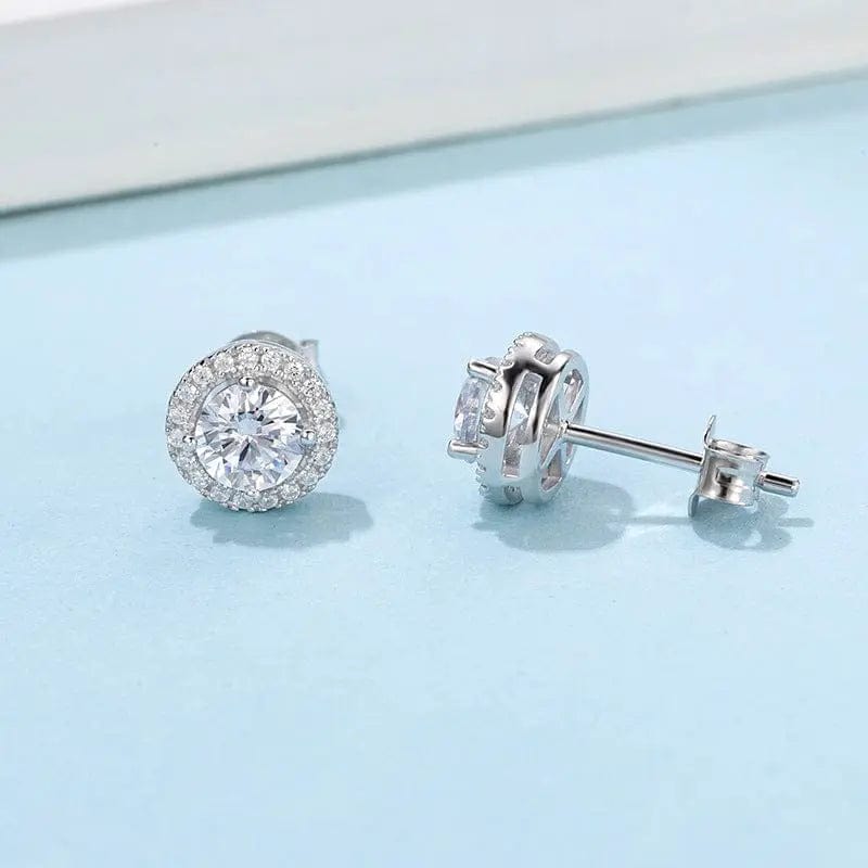 front and ;ateral view round sterling silver moissanite earrings