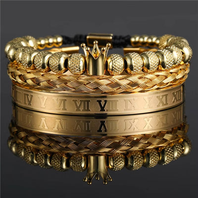 Gold bracelet with Roman numeral design on a reflective surface