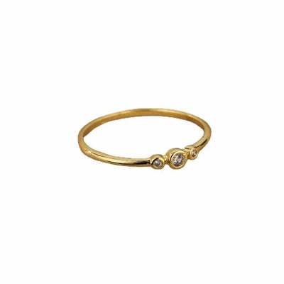 gold ring on a white background