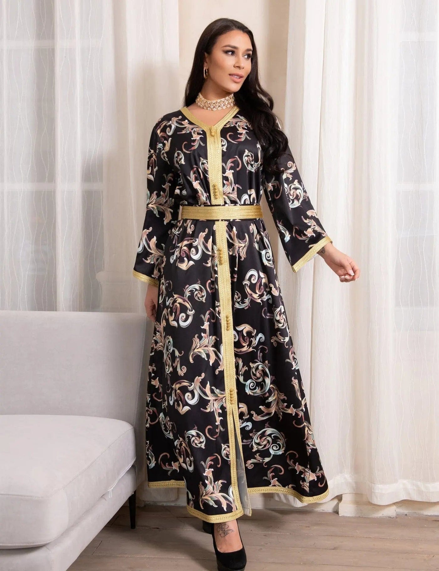 a woman wearing new dubai printed long belt dress full length view