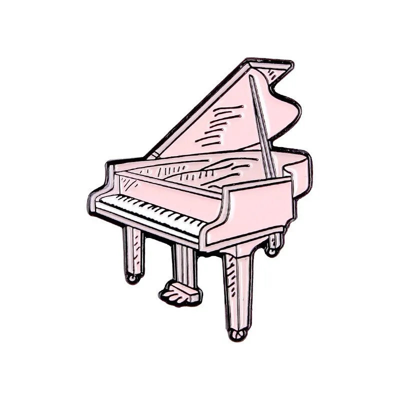 enamel pin of a pink grand piano on a white background