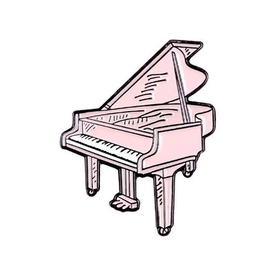 enamel pin of a pink grand piano on a white background