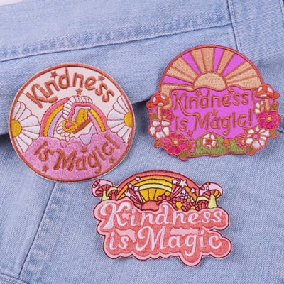 Video of a Collection of colorful embroidered patches with various designs and text.