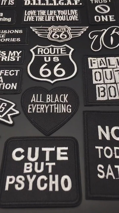 video of Black and white text embroidered patch for jackets, bags, hats – iron-on or sewable
