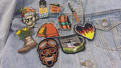 video of a Collection of colorful camping-themed stickers on a light gray background