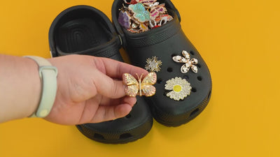 video displaying metal decorative shoe charms