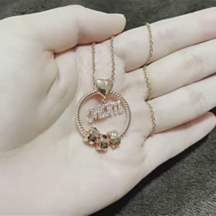 video of Gold necklace with &