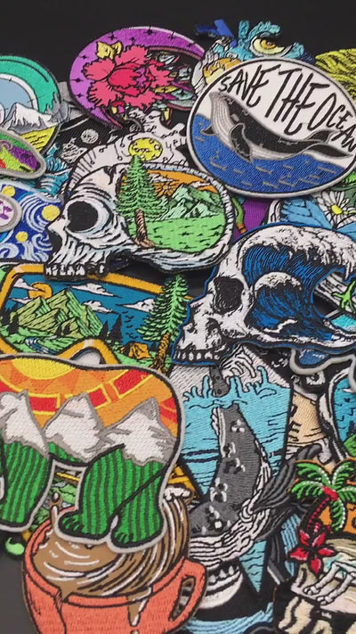 video of a Collection of various colorful stickers on a black background