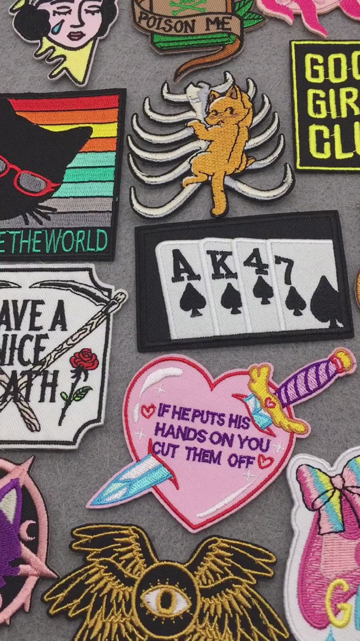 video of Gothic, feminist, punk and witchy embroidered patches – slogans, skulls, potions and cats on grey background