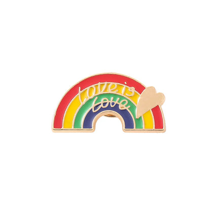 Colorful rainbow-shaped pin with 'Love is Love' text and a heart on a white background