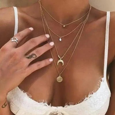 a woman wearing Retro Ethnic Moon Horn Disc Multilayer Necklace