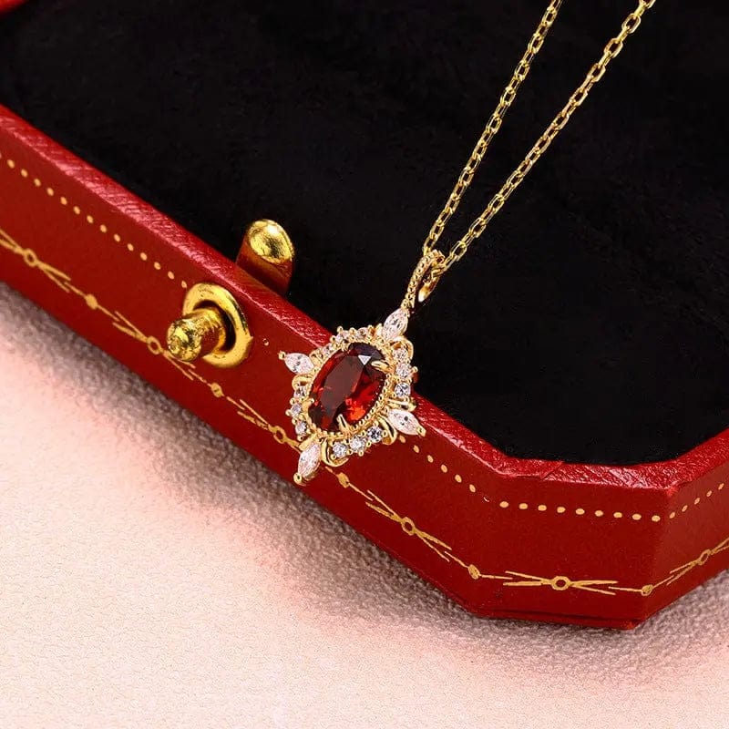 BROOCHITON Necklaces Retro Light Luxury Cross Star Garnet Necklace on a jewelry box