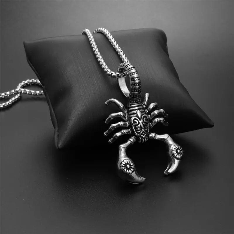silver Scorpion Necklace on a small cushion