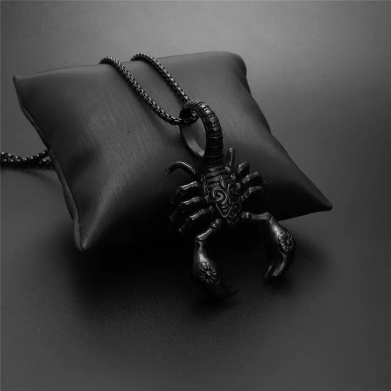 black Scorpion Necklace on a small cushion