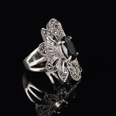 women's hollow flower black crystal ring lateral view