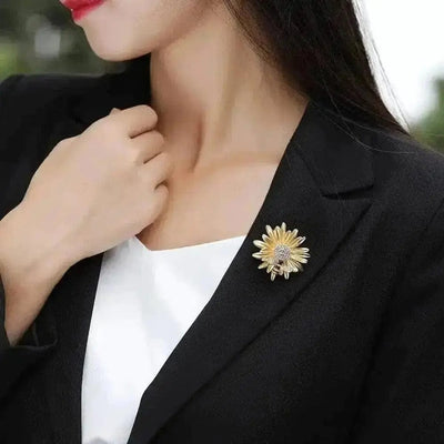 BROOCHITON Brooches a woman wearing Gold Bee On Daisy Flower Brooch on a black dress