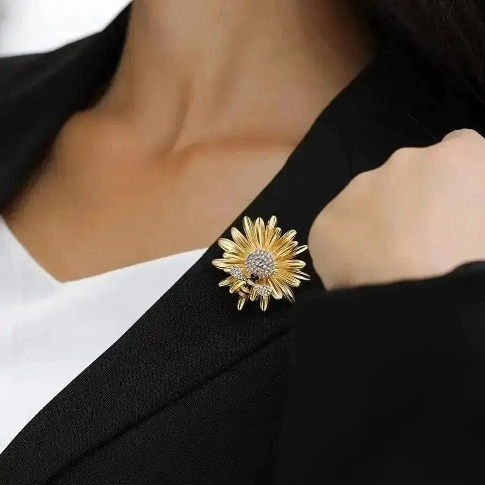 BROOCHITON Brooches a woman wearing Gold Bee On Daisy Flower Brooch on a black dress closeup