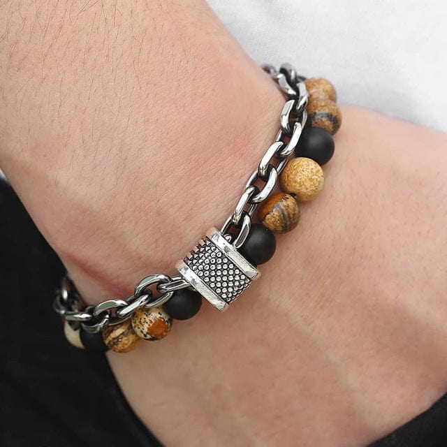 a man hand in jeans pocket wearing a double band bracelet multicolor beads