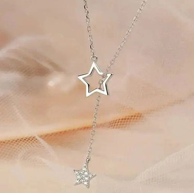 BROOCHITON Necklaces Star Necklace For Women on a peach background