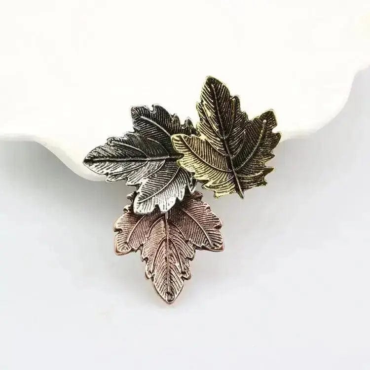 BROOCHITON Brooches Vintage Maple Leaf Brooche on a white plate