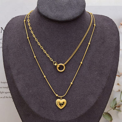 BROOCHITON women's titanium love necklace on a neck model