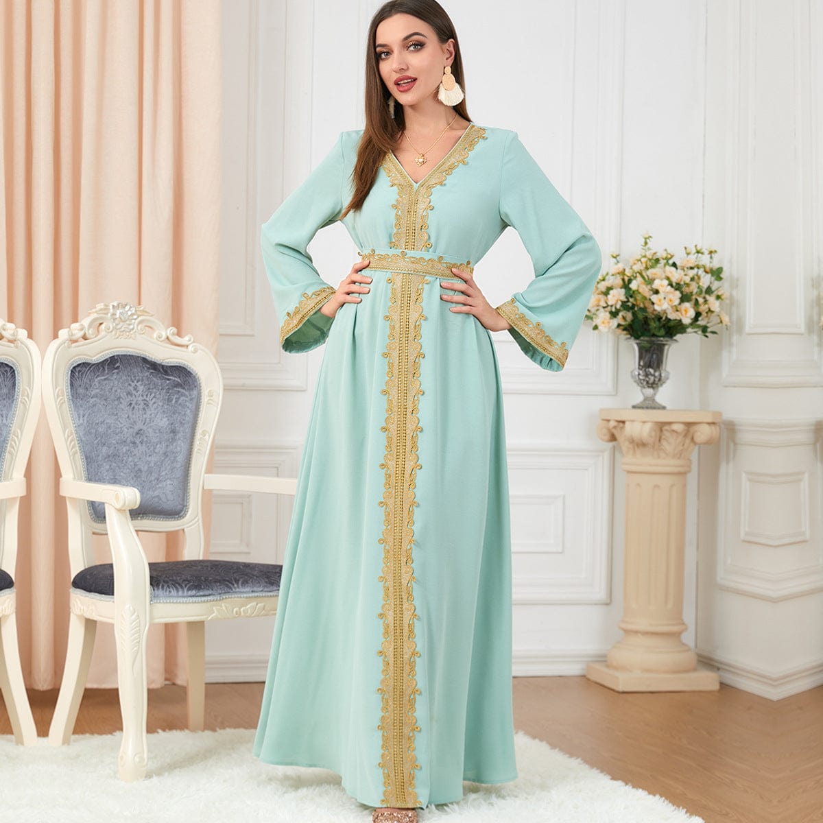 a woman wearing Light Green solid color embroidery long-sleeved dress full length view